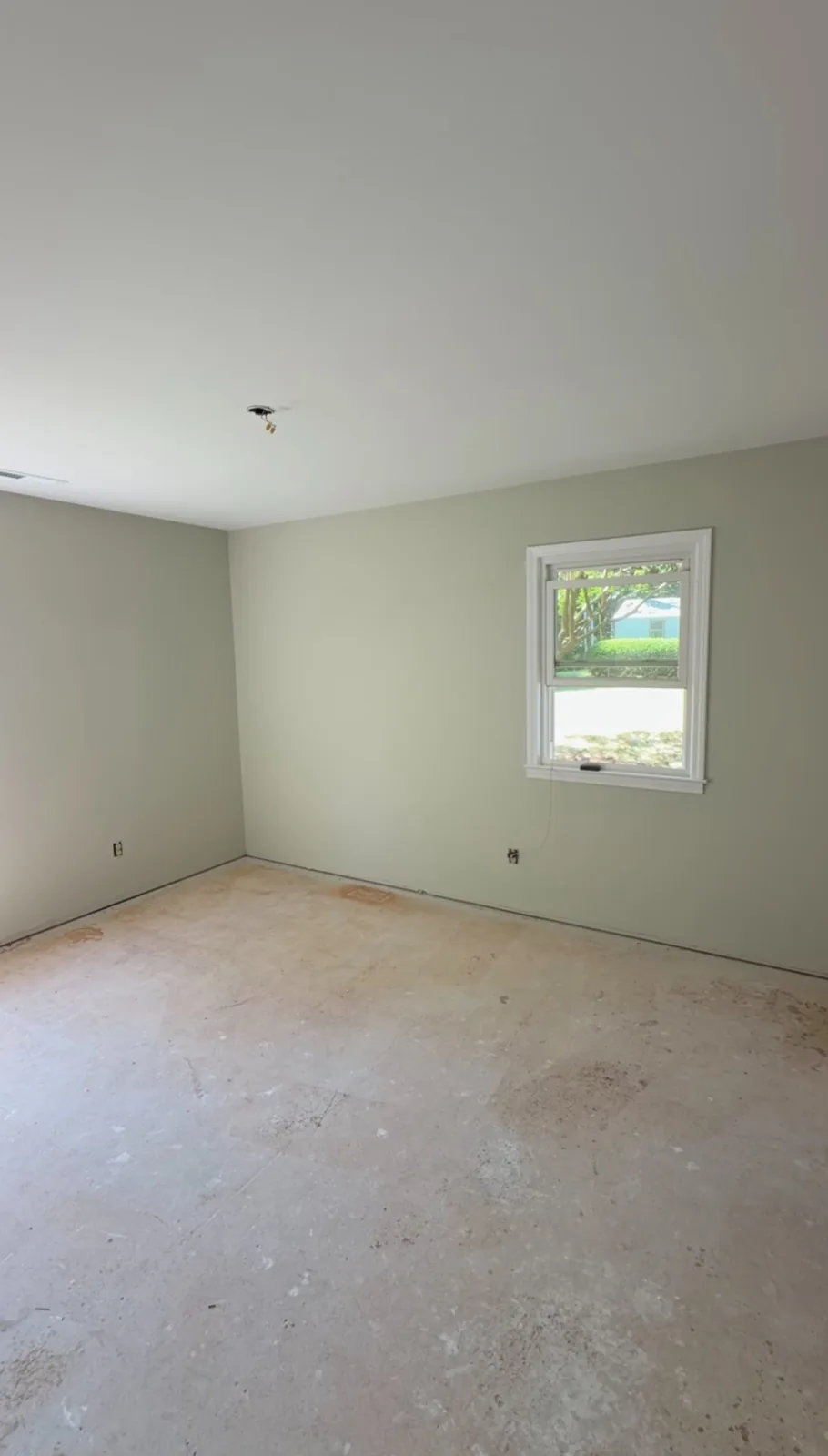 Bedroom with the floor covering removed before installation