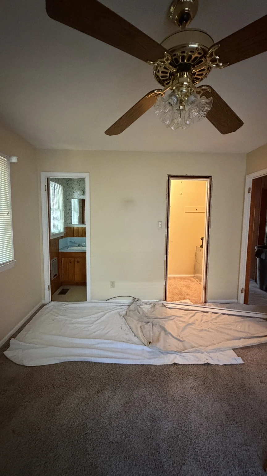 Separate doorways to the original half bath and adjacent closet